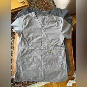 Set of 3 small scrubs bundle- light grey, dark grey, and black.